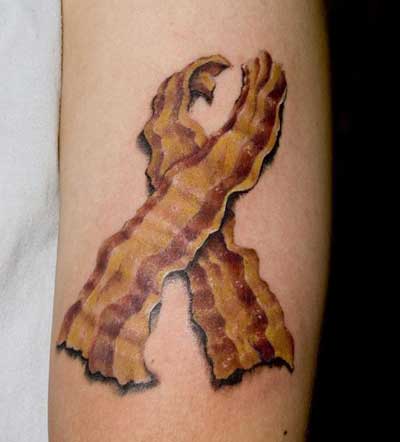 domino goldfish tattoo. What is up with Bacon tattoos?